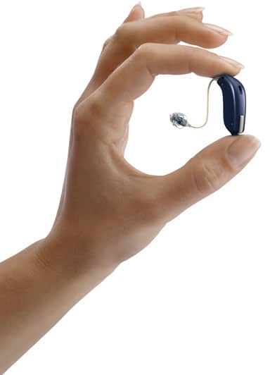 hearing aid being held by hand